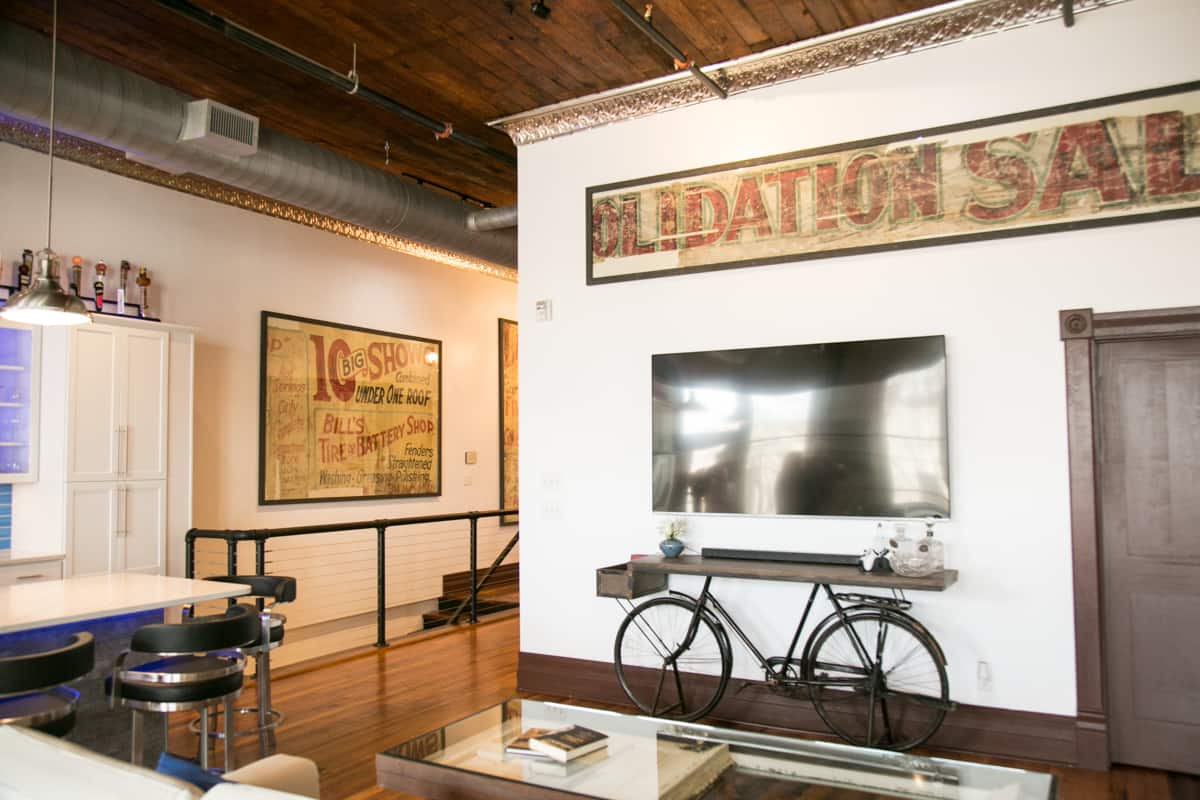 Television wall with vintage Hot Springs signs