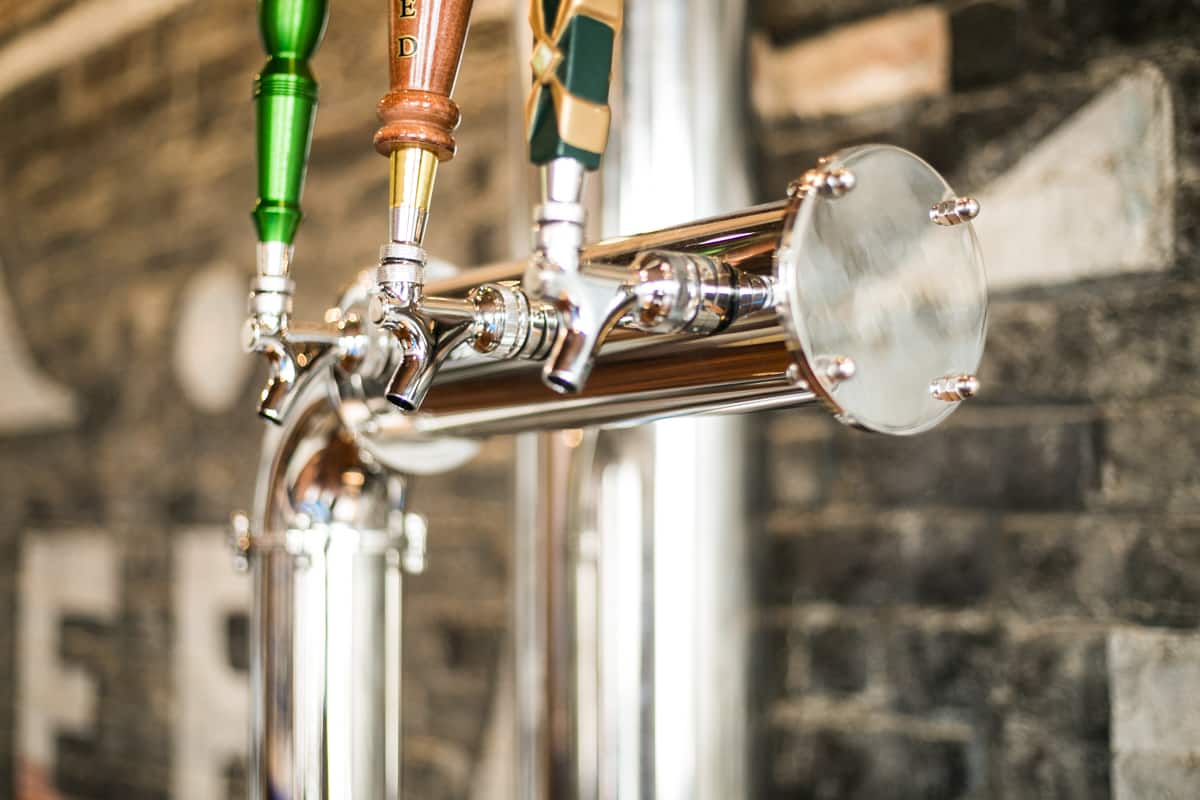 Close view of the loft's draft beer taps
